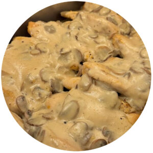 Chicken Danuta, a Polish Hall special, is shown ready to serve: chicken breast with a mushroom cream sauce.